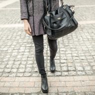 Close-up of unrecognizable woman wearing fashion clothes and bag.